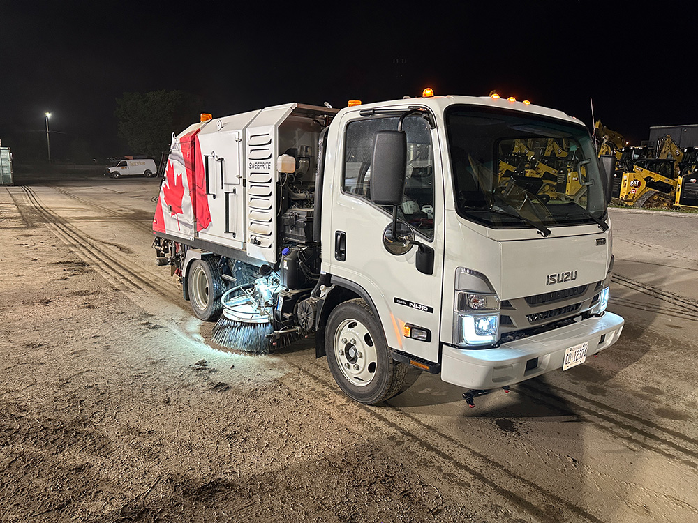 A photo of a street sweeper.